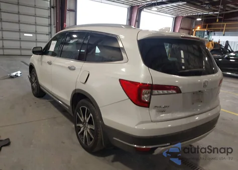 2020 Honda Pilot 2Wd Touring 8 Passenger from USA, damaged, VIN 5FNYF5H98LB009570